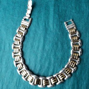 2/10$ Two tones metal bracelet